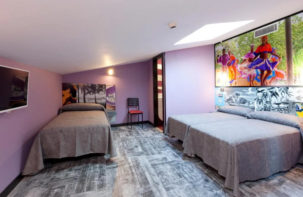 Chambre triple Deluxe — JC Rooms Chueca