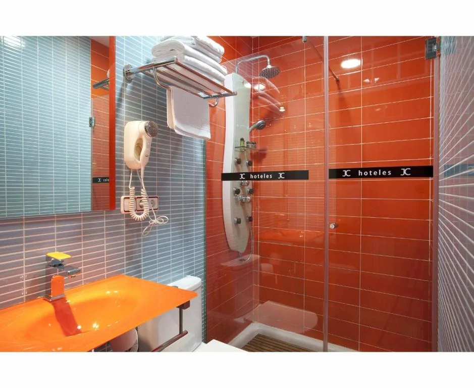 Habitación Triple Executive — JC Rooms Santo Domingo