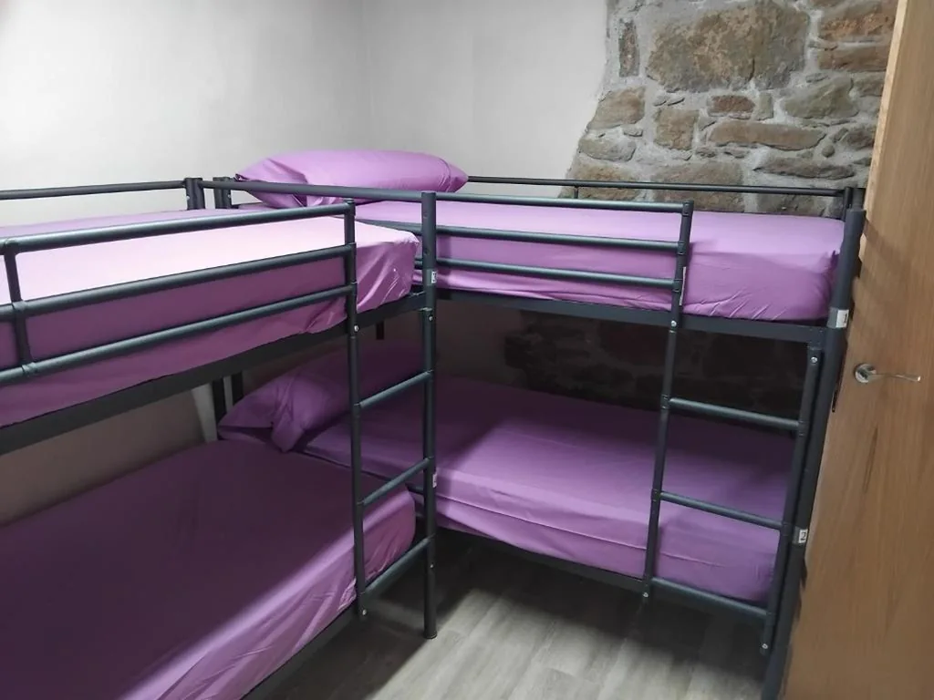 Habitación cuádruple — L'alberg la rectoria de la Torra