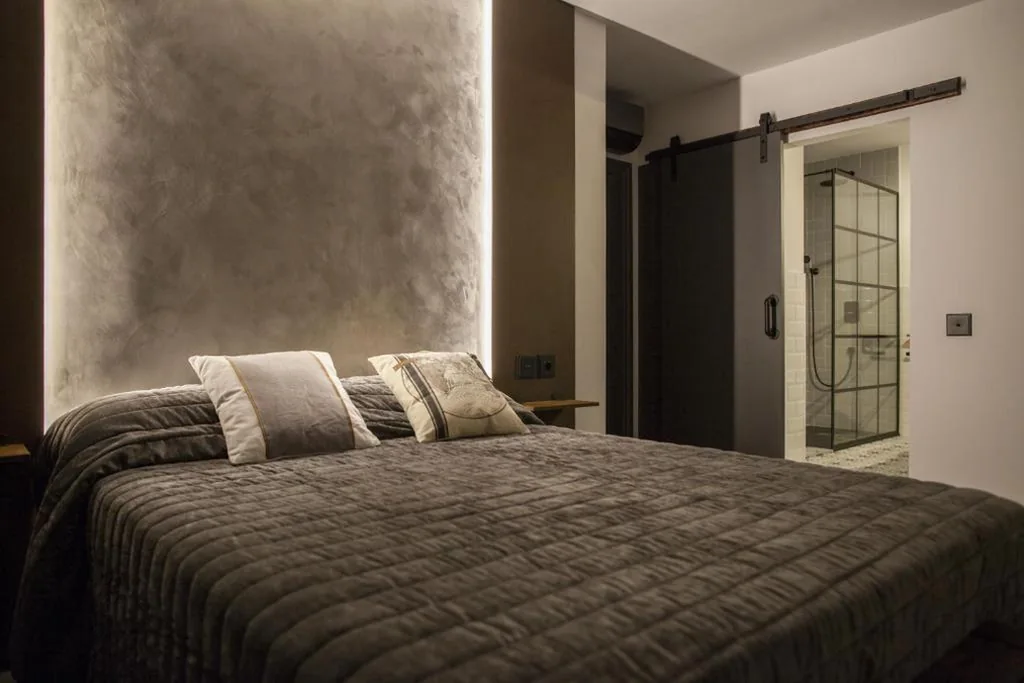 Suite met groot tweepersoonsbed — La Aduana - The Lodging Experience