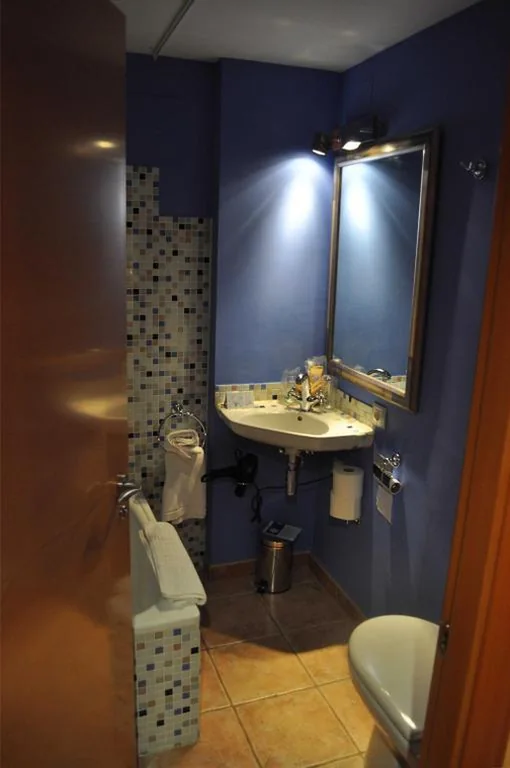 Camera Familiare con vista (2 adulti + 2 bambini) — La Alquería