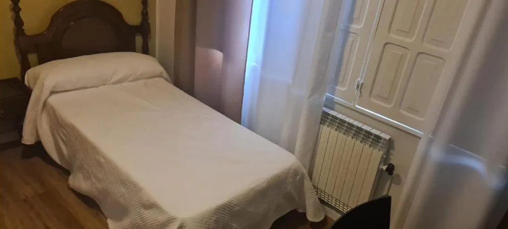 Quarto Individual — La casa de la abuela