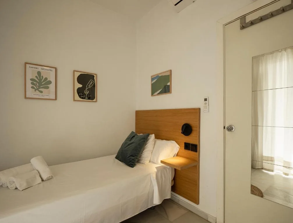 Chambre individuelle avec salle de bains commune — La Central Sevilla