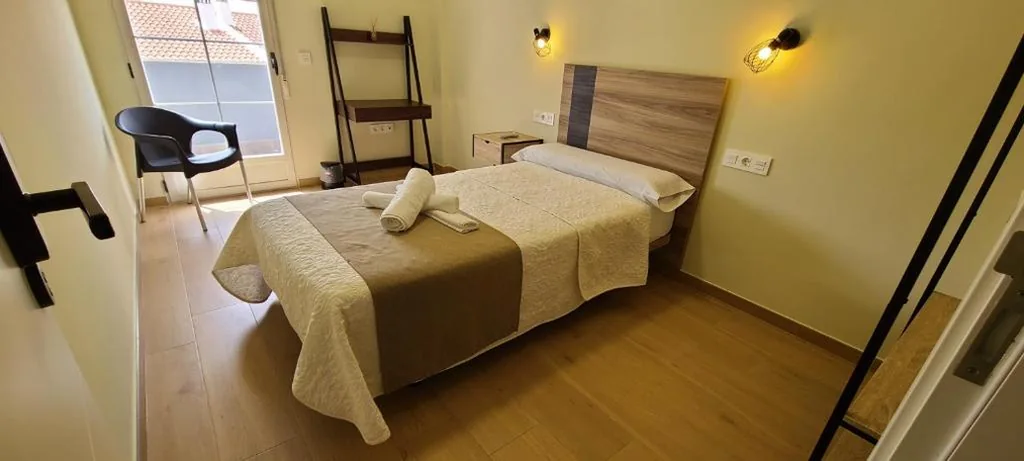 Quarto Individual com casa de banho partilhada — La familia