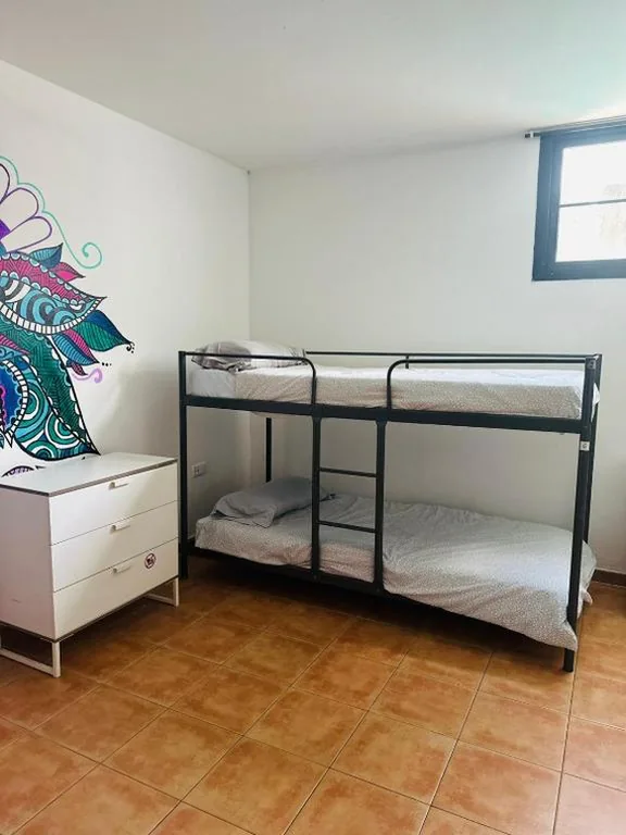 Bed in 6-Bed Mixed Dormitory Room — La Fresa Guest House Corralejo