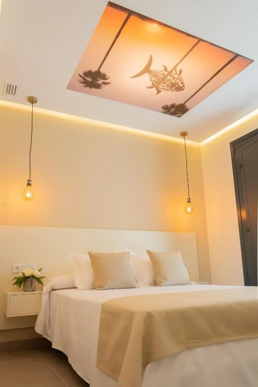 Doppelzimmer mit Zustellbett — La Mina Hostal Boutique