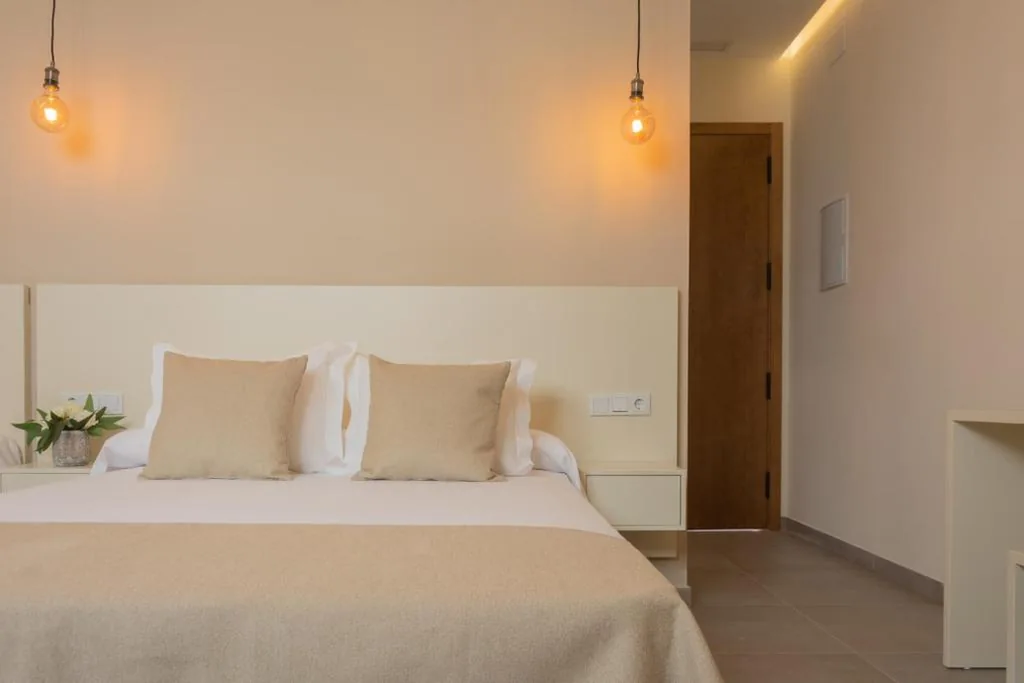 Dreibettzimmer — La Mina Hostal Boutique
