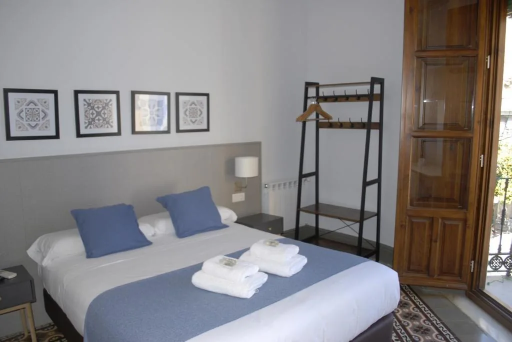 Habitación Doble — La Perla Granada Suites