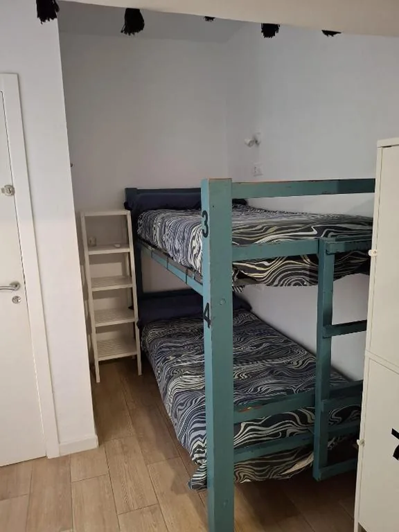 共用バスルーム付きエコノミー4人部屋 — La Pita Beach house