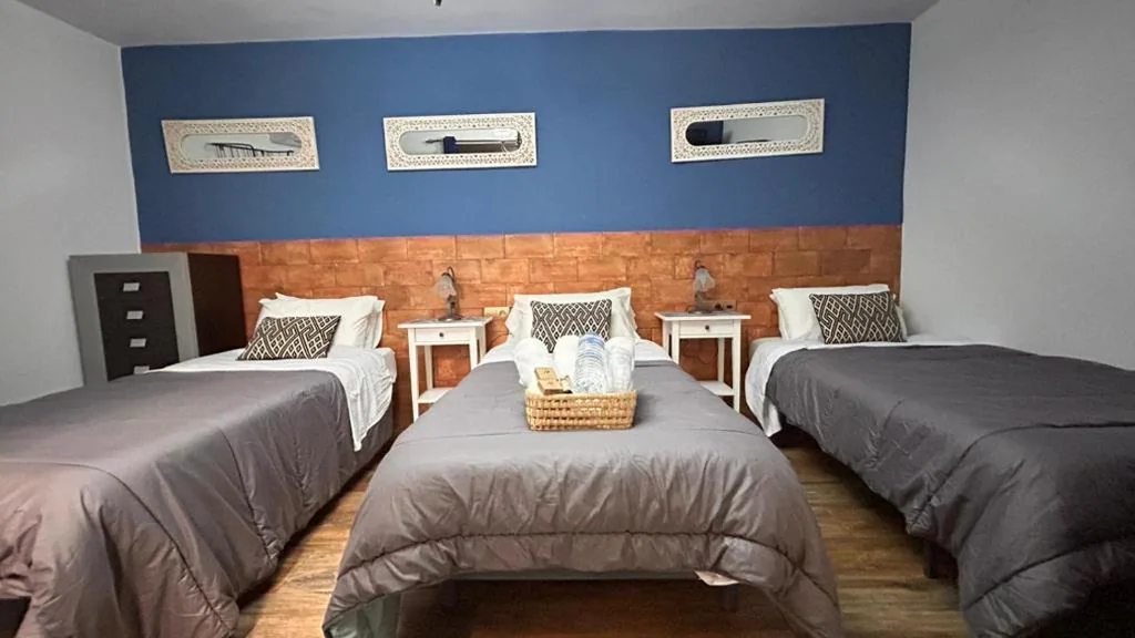 Triple Room with Private Bathroom — La posada del Cani