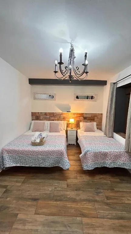 Standard Triple Room — La posada del Cani