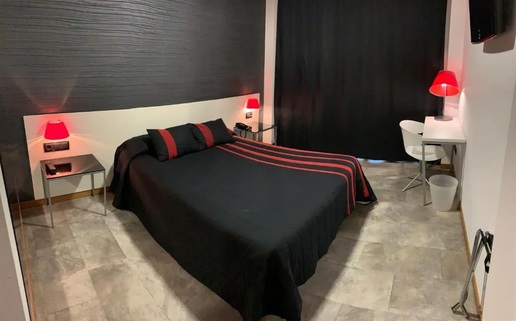 Camera matrimoniale — La Suite Hotel
