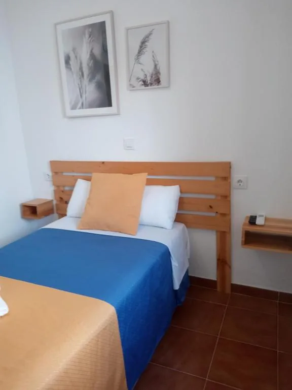 Camera Singola Standard con bagno in comune — La Tortuga Lodging Rooms