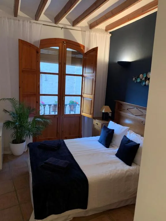 Camera matrimoniale con bagno privato — Las Puertas Del Indiano