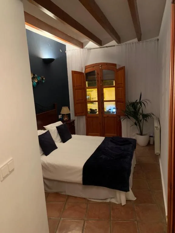 Camera matrimoniale con bagno privato — Las Puertas Del Indiano