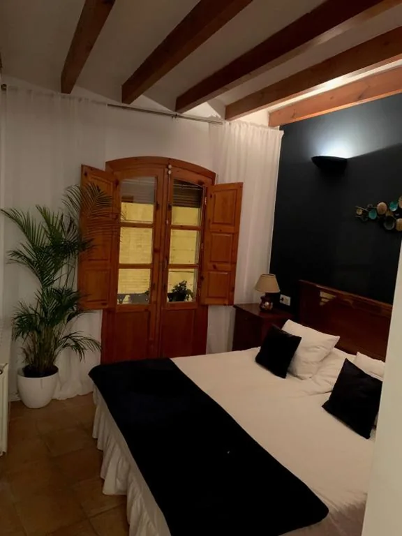 Camera matrimoniale con bagno privato — Las Puertas Del Indiano