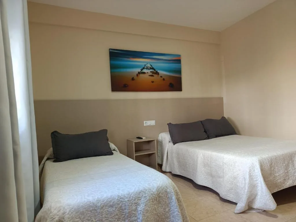 Camera tripla con bagno privato — Las Rosas