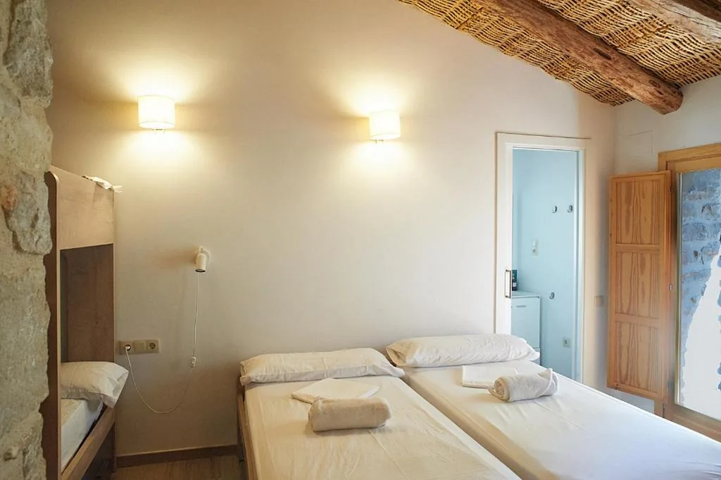 Habitación cuádruple — Lo Molí de Bot