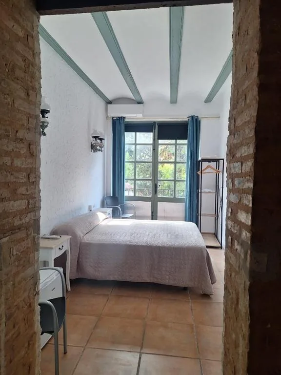 Camera matrimoniale con balcone — Lotel Casa Noble La Solana