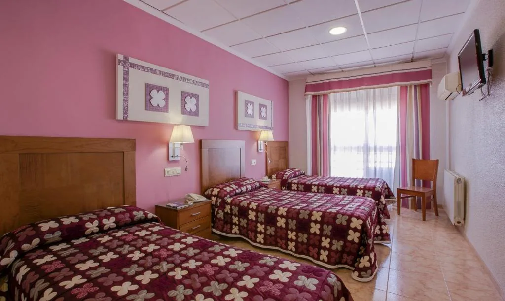 Habitación Triple — Manolo