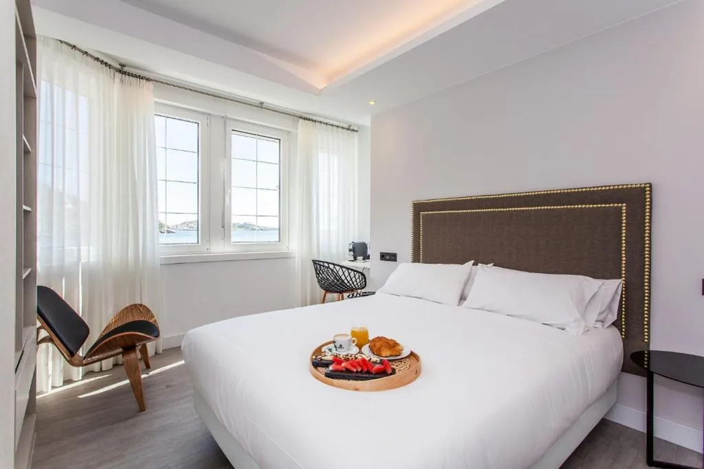 Habitación Doble con vistas al mar — Mar do Ézaro - Boutique Hotel