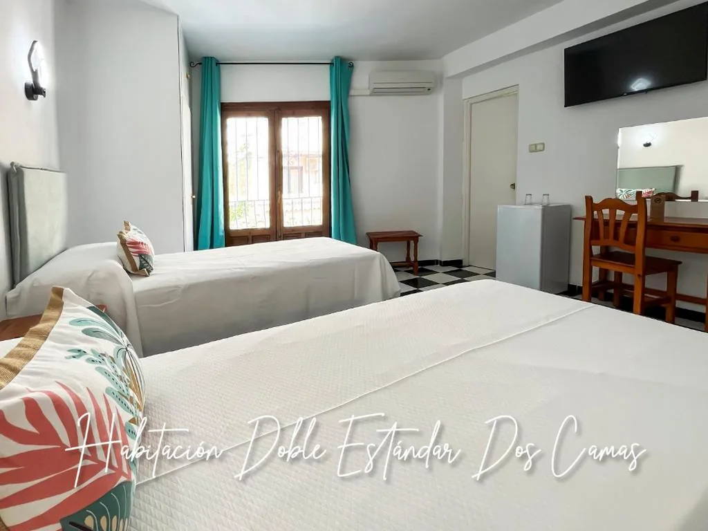Quarto Duplo Standard - 2 camas — Micaela Charming Hostal