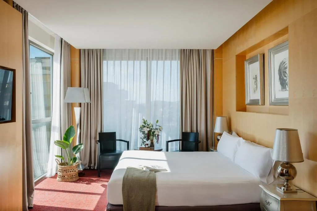 Suite Junior con vistas a la ciudad — MiM Sitges member of Meliá Collection