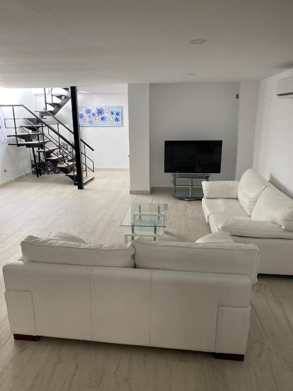New - MiJa basement Loft Apartment steps from Beach - perfect for Sun and Sport Seekers