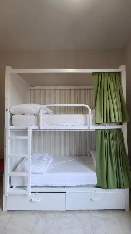 Letto in dormitorio condiviso da 8 posti — New Samay Hostel