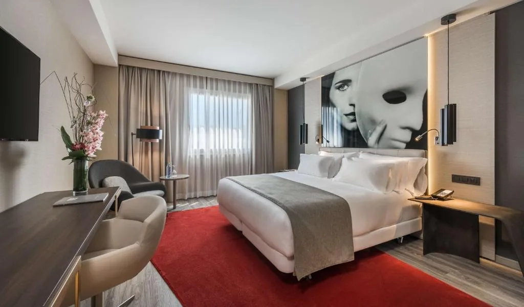 Habitación Doble Premium con cama supletoria - 1 o 2 camas — NH Collection Madrid Suecia
