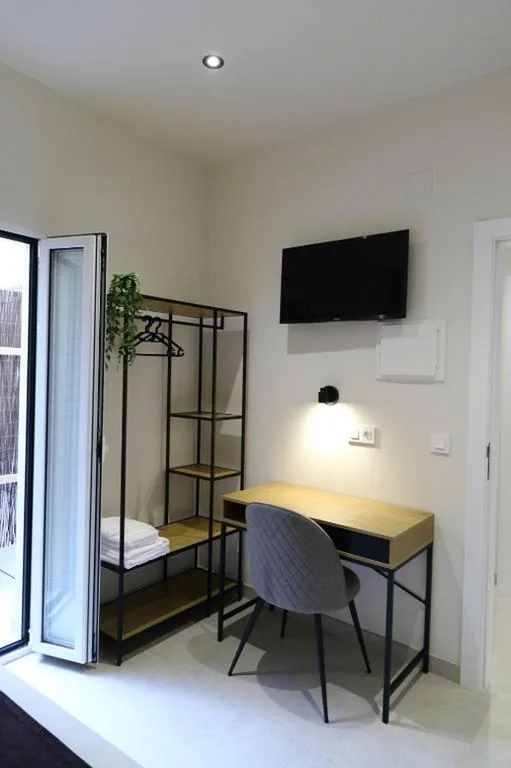 Quarto Duplo com casa de banho privativa — Niu Hostal