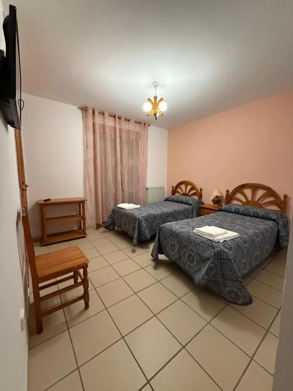 Quarto Duplo com Varanda - 2 camas — Nuevo Hostal Rasil