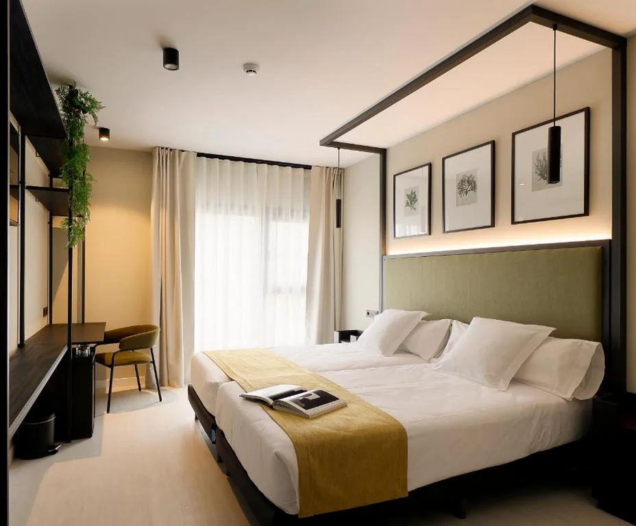 Quarto Duplo com vistas - 2 camas — Nuvō Hotel Boutique