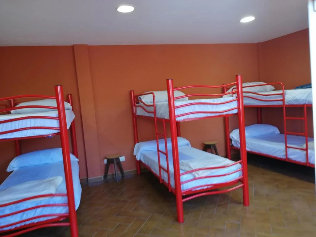 Letto a castello in dormitorio condiviso misto — O Encontro