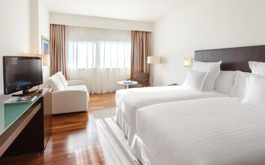Quarto Triplo — Occidental Aranjuez