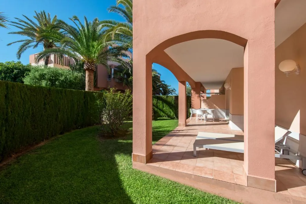 Suite classica con giardino — Oliva Nova Beach & Golf Hotel