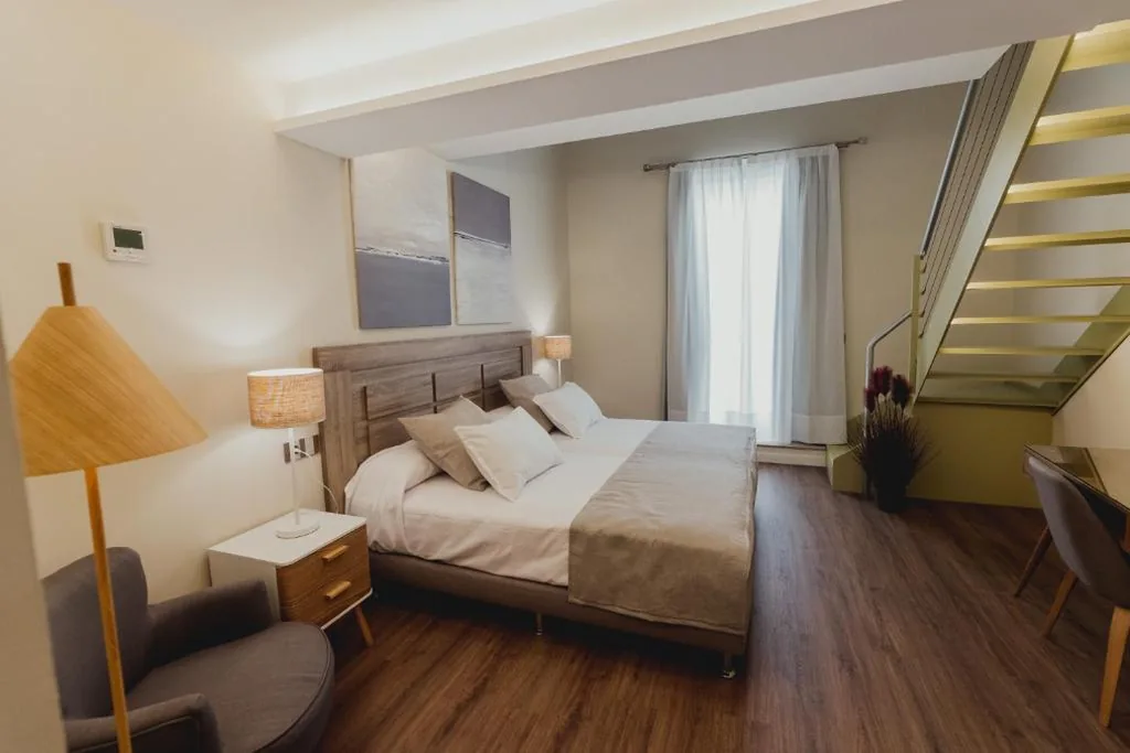 Chambre Triple — Olivae Hostal Boutique