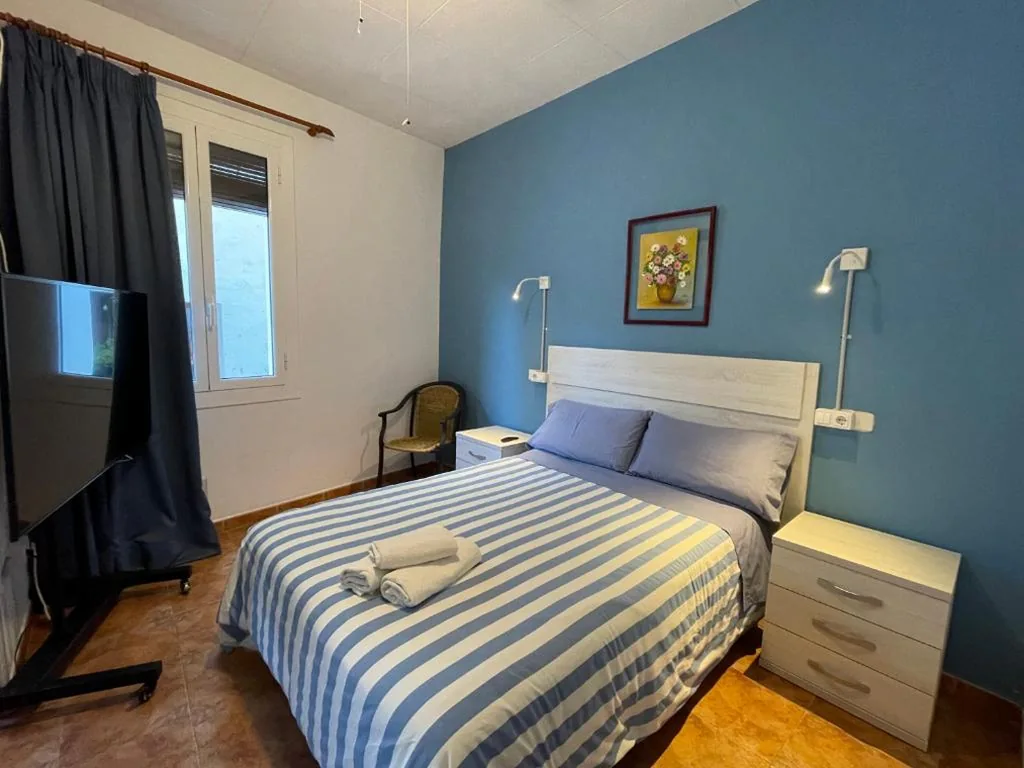 Habitación Cuádruple Confort — P&R hostals Can Tort