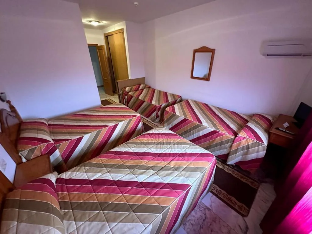 Camera Quadrupla con bagno privato — P Residencia PIVIDAL