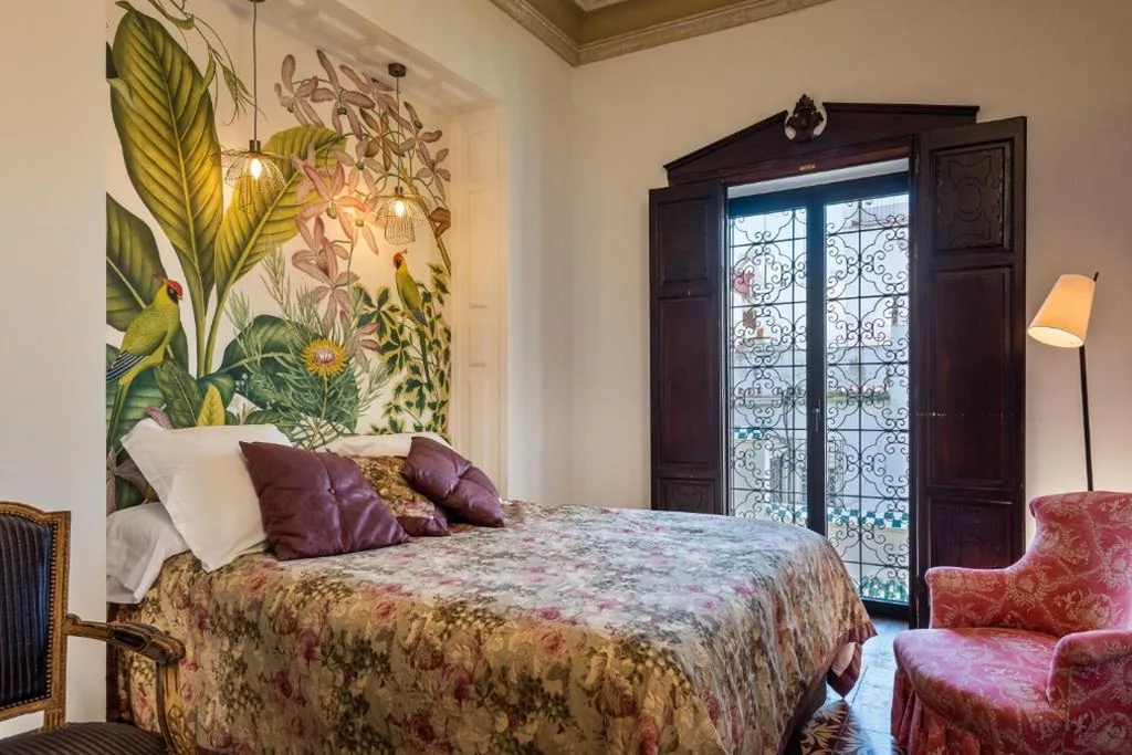 Habitación Doble con vistas a la piscina — Pájaro Rebelde
