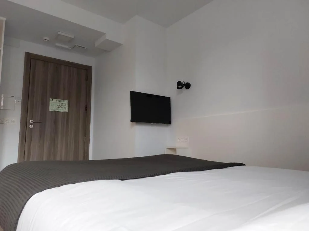 Tweepersoonskamer met 1 of 2 bedden — Pensión Amorrortu Lemona