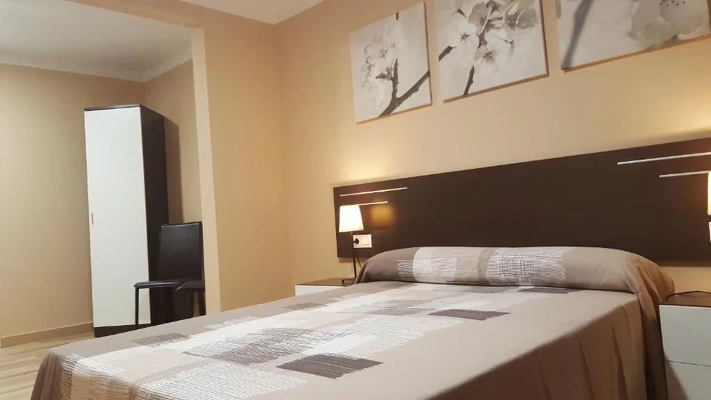 Quarto Duplo Superior — Pensión Avenida