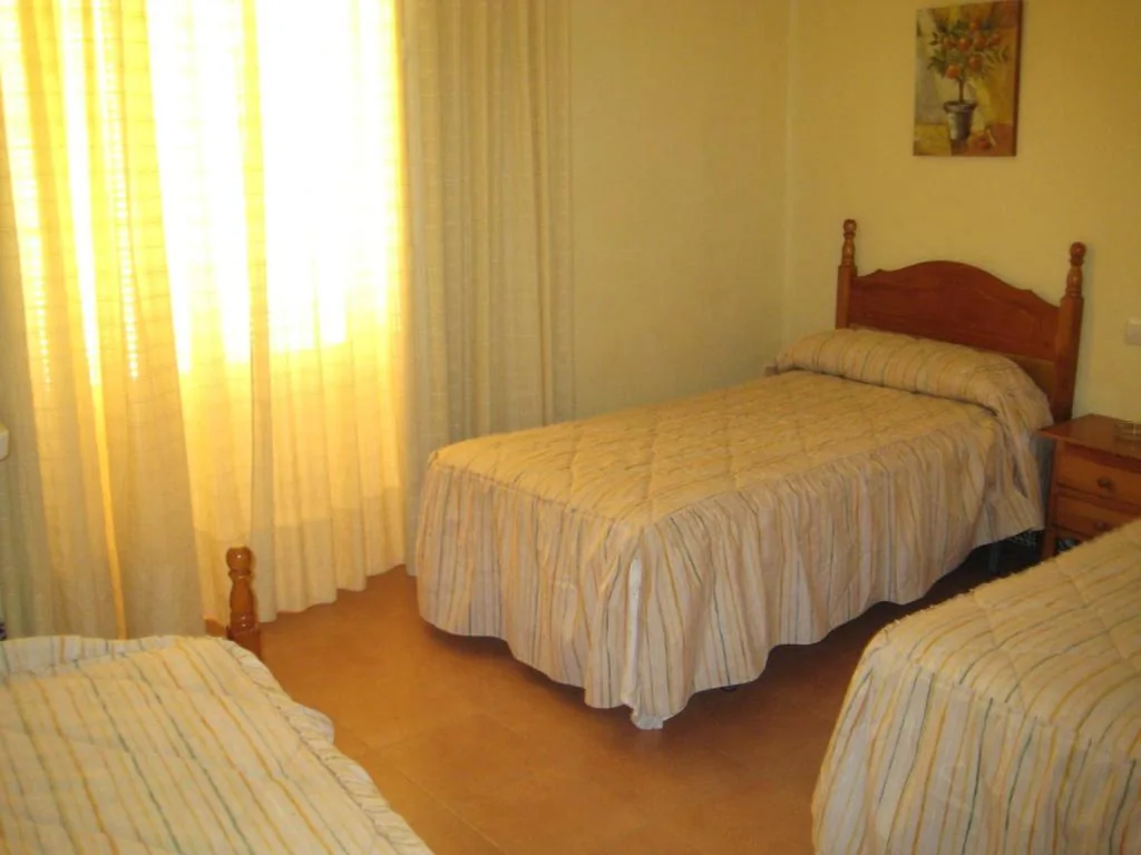 Dreibettzimmer mit Gemeinschaftsbad — Pensión Bienvenido
