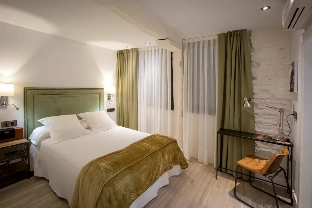 Quarto Duplo Básico — Pensión Boutique Caravan Cinema