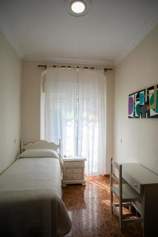 Quarto Individual com casa de banho partilhada — Pensión Dulces Sueños