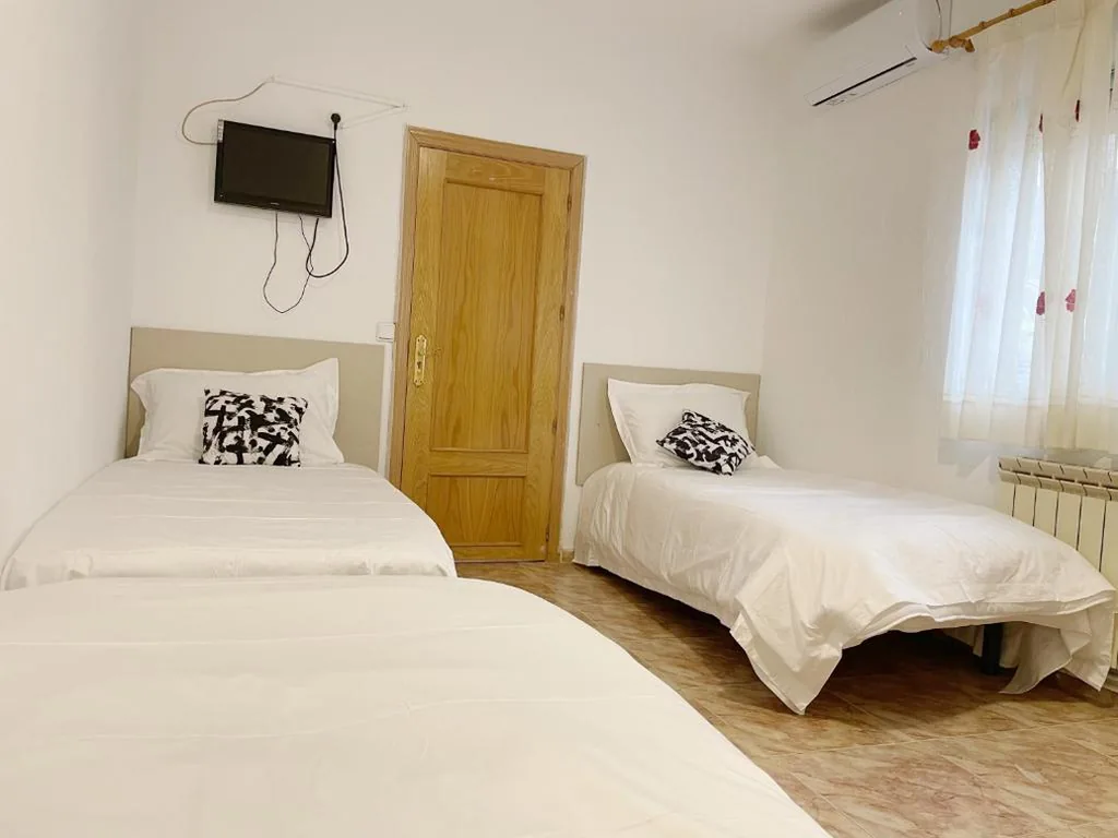 Quarto Triplo com casa de banho privativa — Pensión el Carmen