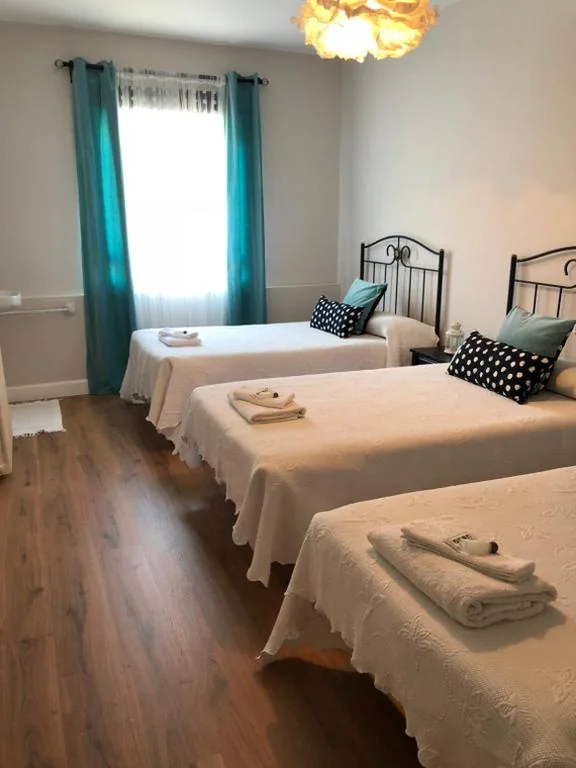 Dreibettzimmer — Pensión Fernández