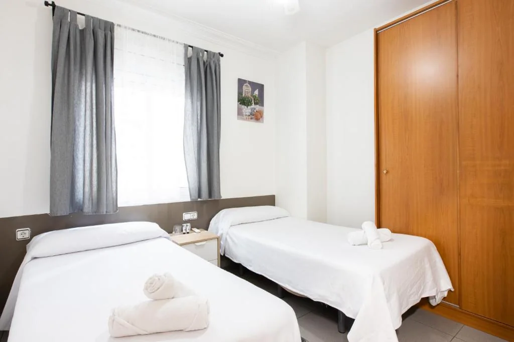 Quarto Duplo com casa de banho partilhada - 2 camas — Pensión Galicia