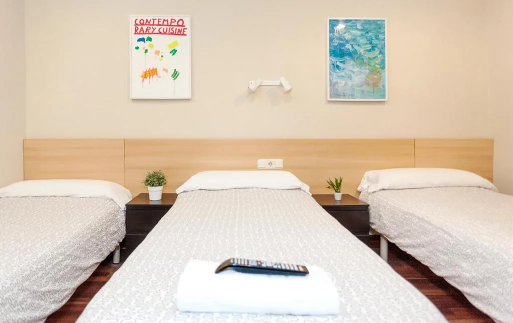 Dreibettzimmer mit Gemeinschaftsbad — Pensión Goiko