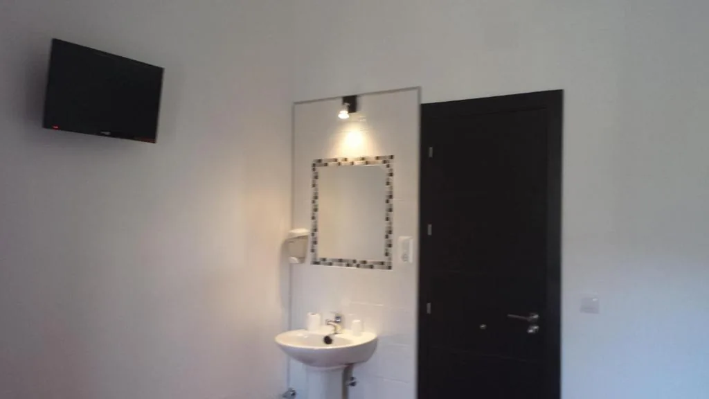 Double Room with Shared Bathroom — Pension Gran Plaza